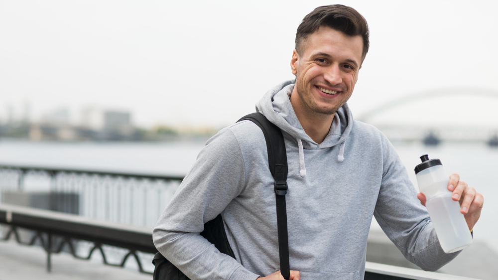 Active man smiling outdoors representing improved energy after testosterone therapy in Voorhees Township NJ