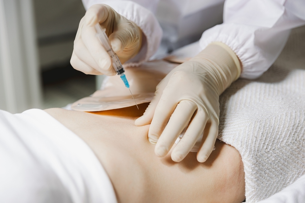 Healthcare provider administering a subcutaneous injection at a peptide therapy clinic serving Marlton NJ