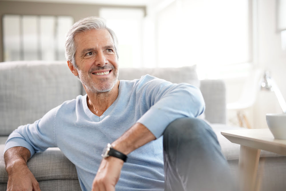 Older man smiling with restored energy and vitality from a TRT clinic serving Haddonfield NJ